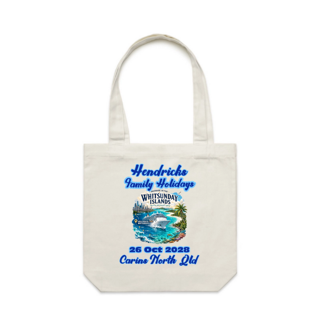 Personalised cream Carrie tote bag for a Brisbane to Whitsundays cruise, featuring custom family name, cruise date and matching tropical cruise design.