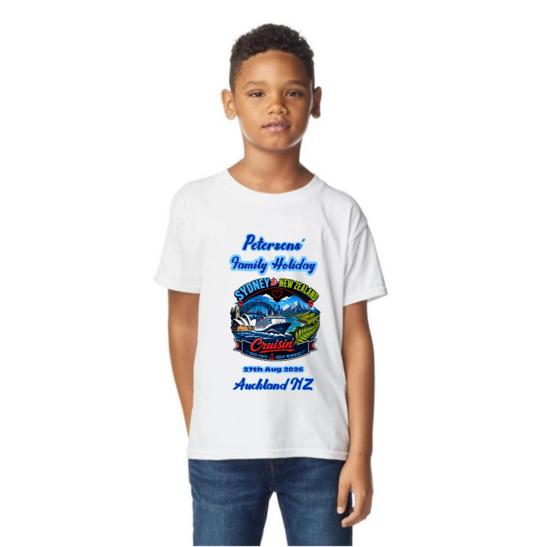 Young boy wearing a personalised white Gildan 64000B Youth Tee with front print for a Sydney to New Zealand cruise, featuring family holiday text, cruise date and New Zealand destination.