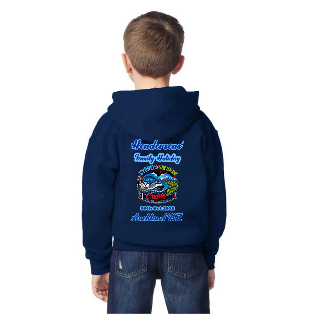 Youth wearing a personalised navy Gildan 18500B Kids Hoodie with back print for a Sydney to New Zealand cruise, featuring family name, cruise date and Auckland NZ destination.