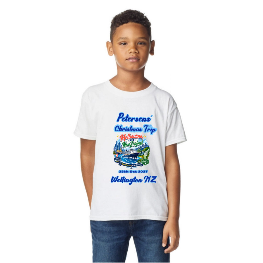 Boy wearing a personalised white Gildan 64000B Youth Tee for a Melbourne to New Zealand cruise, featuring a front print with family name, cruise date and Wellington stopover.